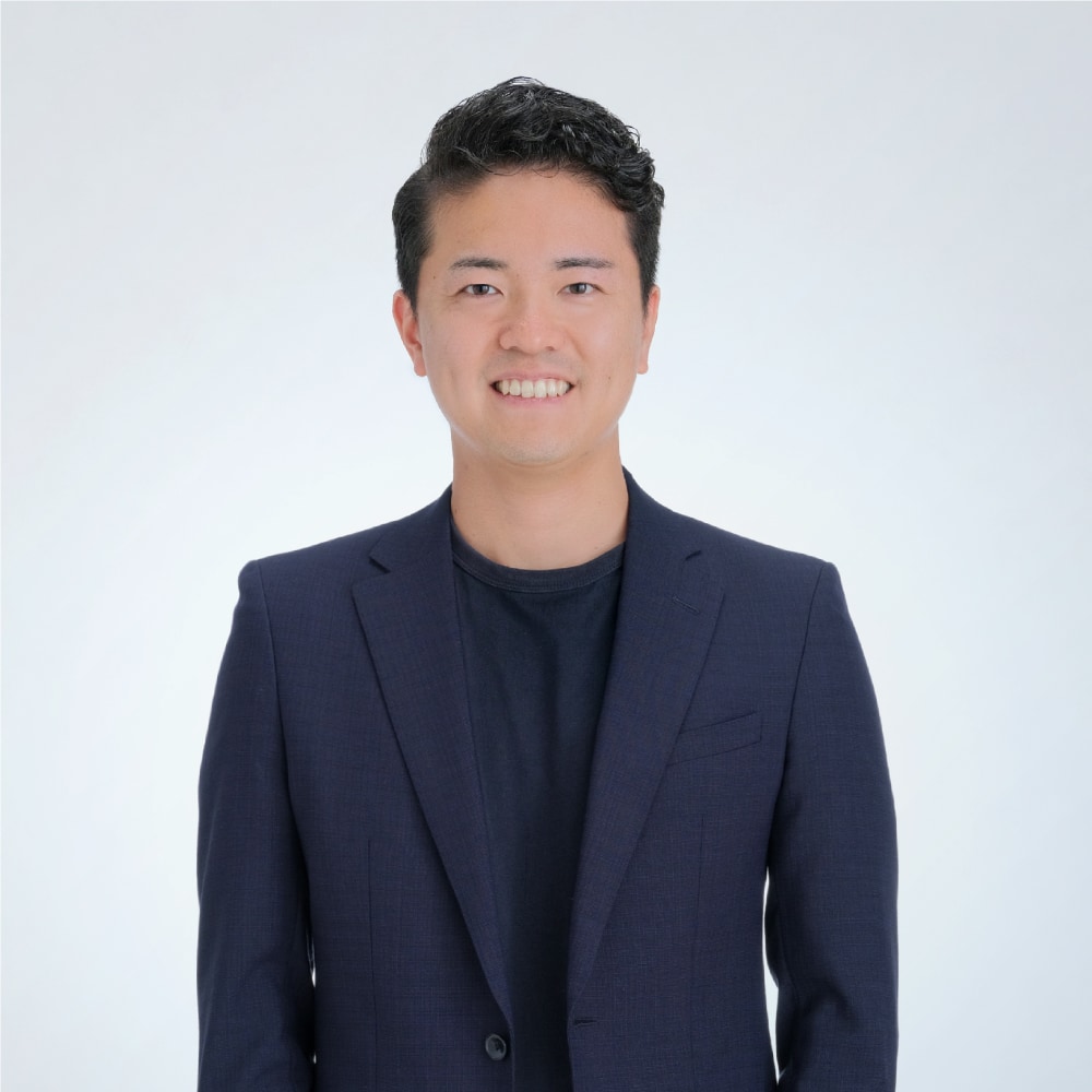 事業部長本間政裕の写真